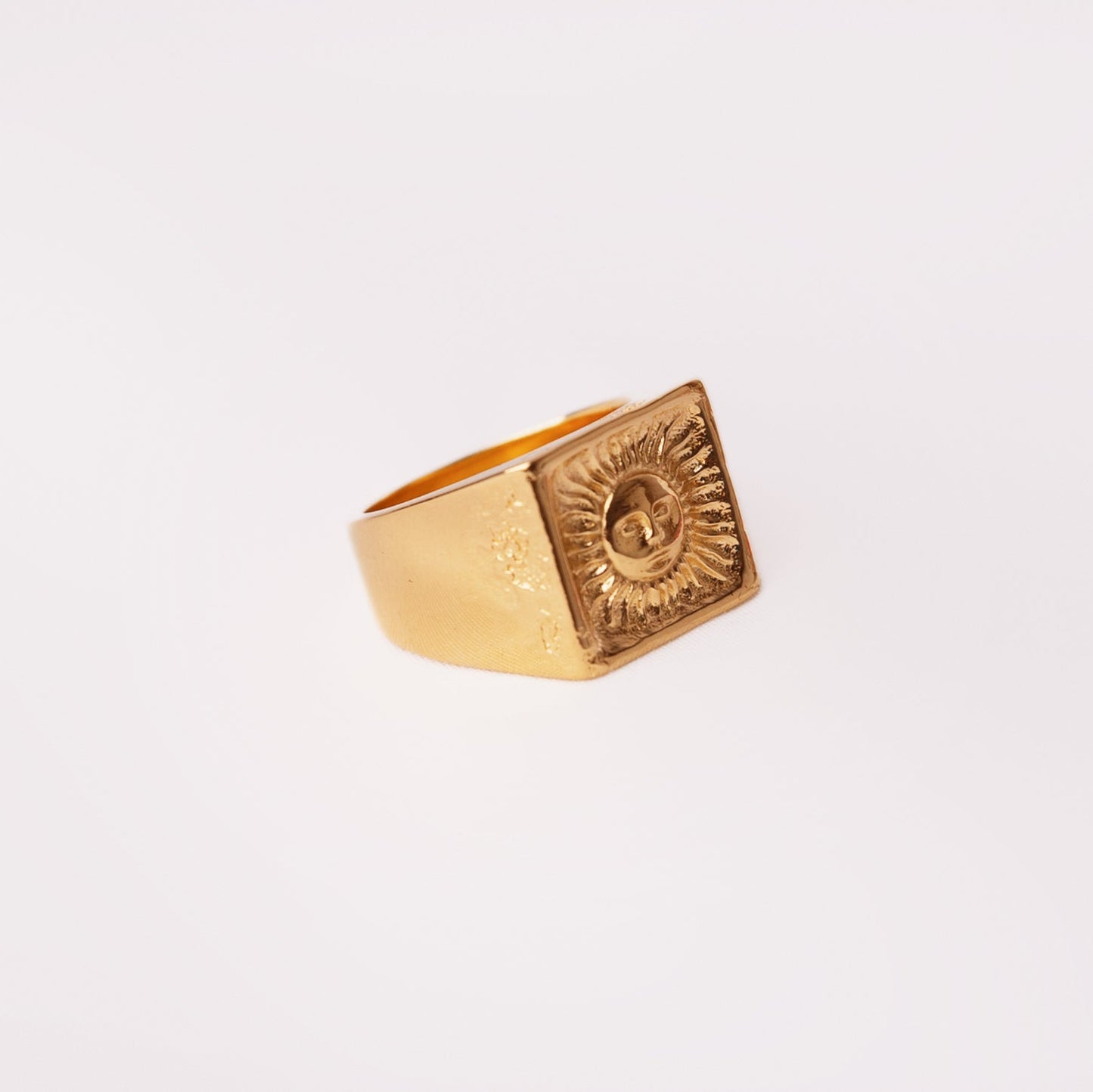 golden sun face ring