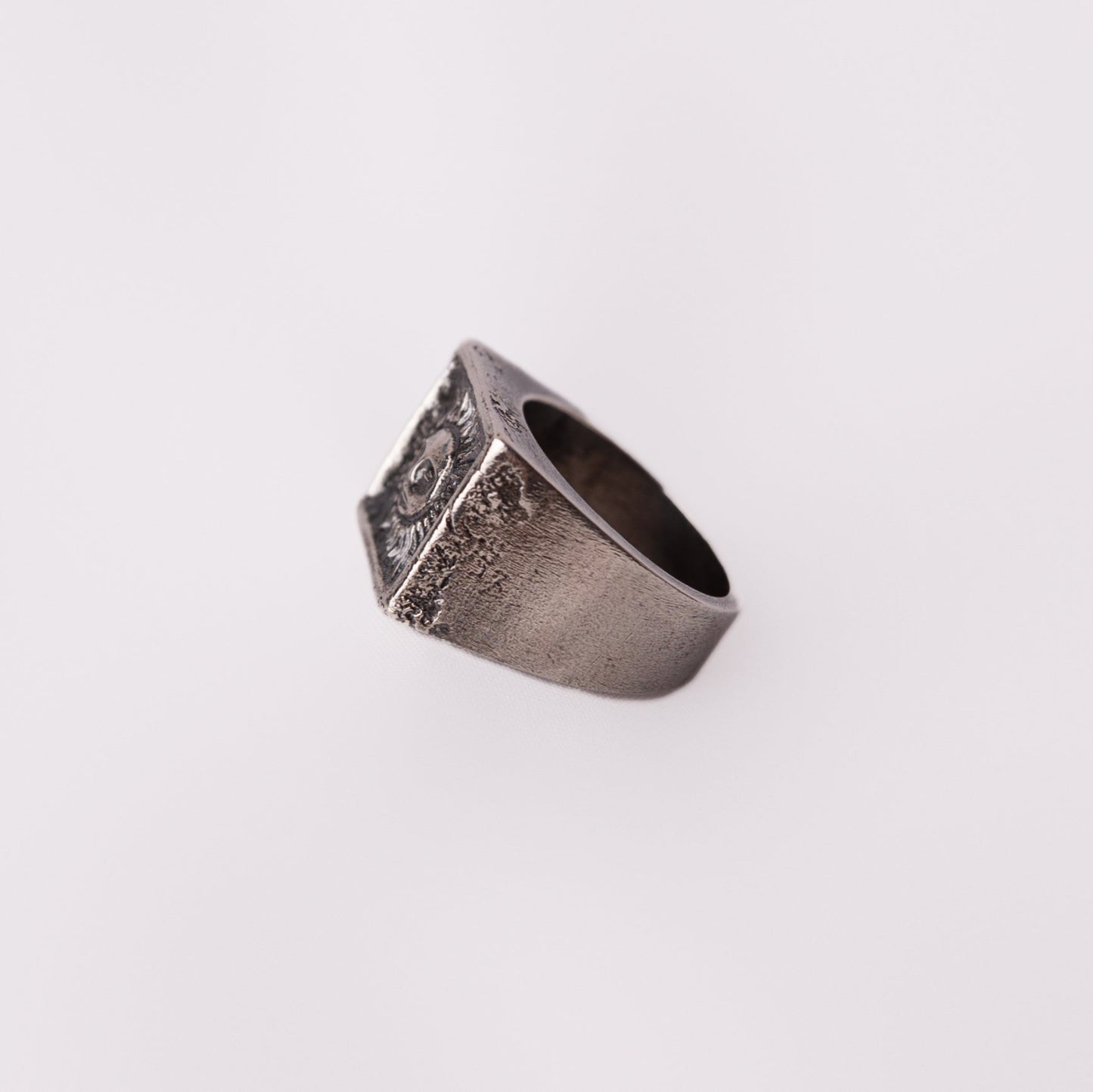 textured black brutalist ring