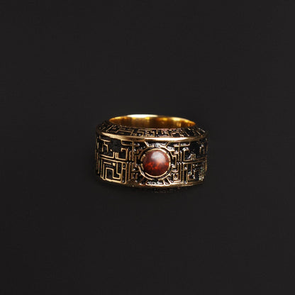 Geometric ring with sci-fi motifs and semiprecious stone