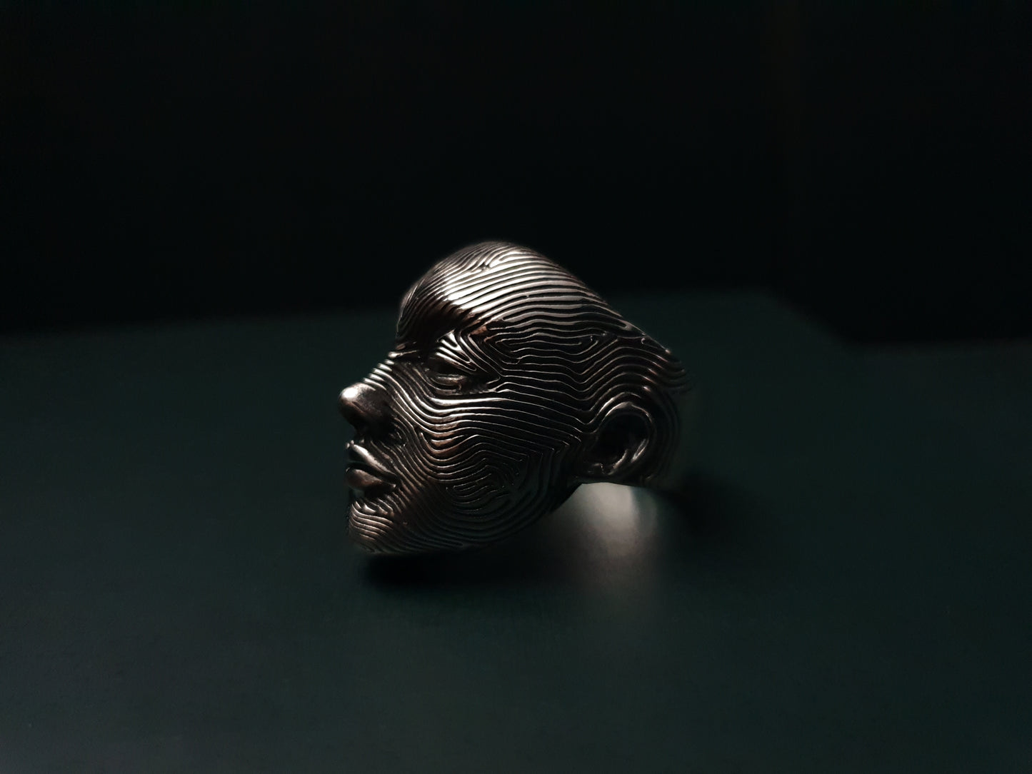 unique spiritual ring featuring a woman's face